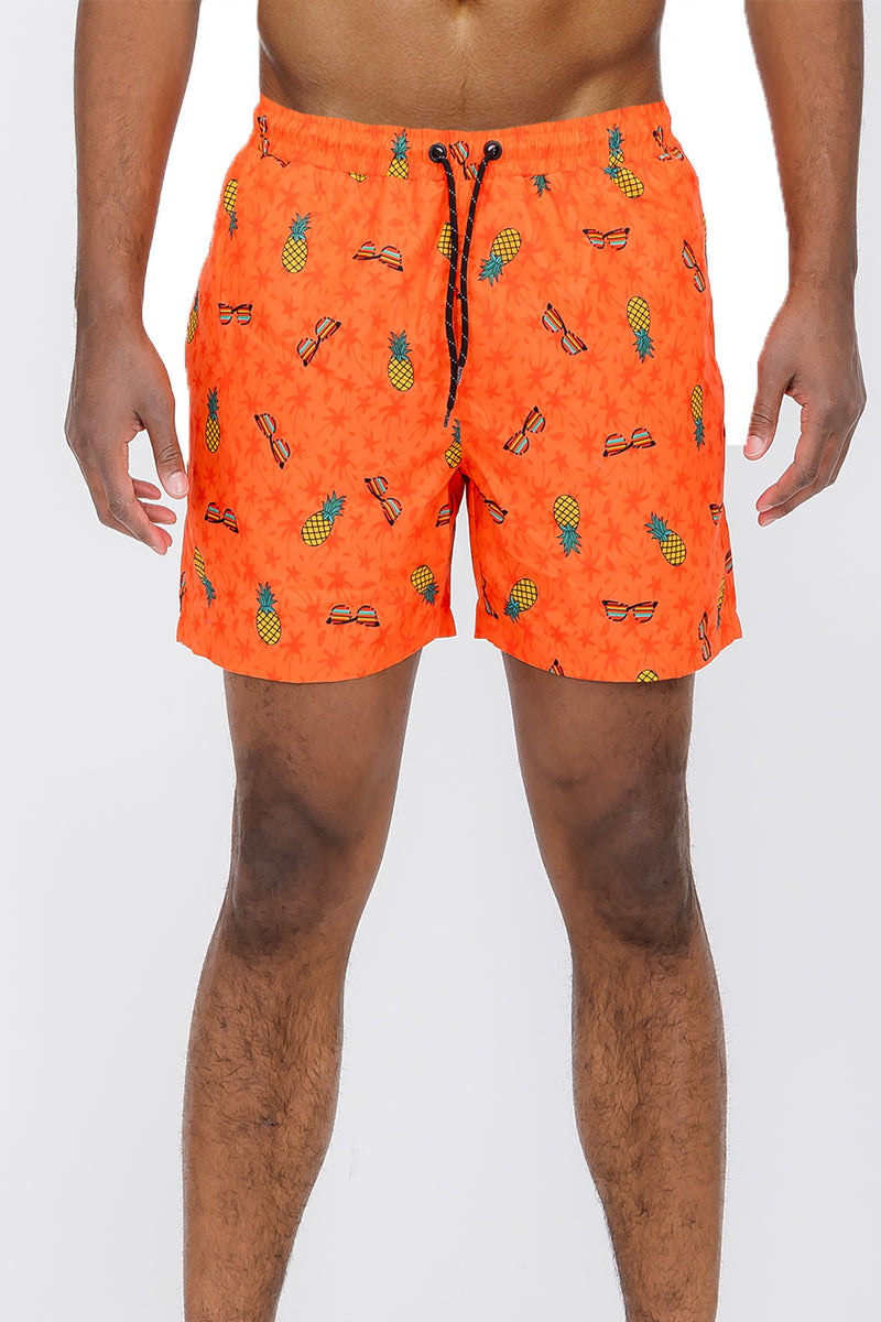 Pineapple Shade Print Swim Shorts featuring a vibrant tropical design, made from 100% polyester with mesh lining and pockets.