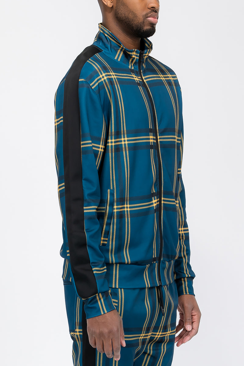 A stylish plaid out jacket featuring a full zip closure and standard pockets, perfect for layering in any season.