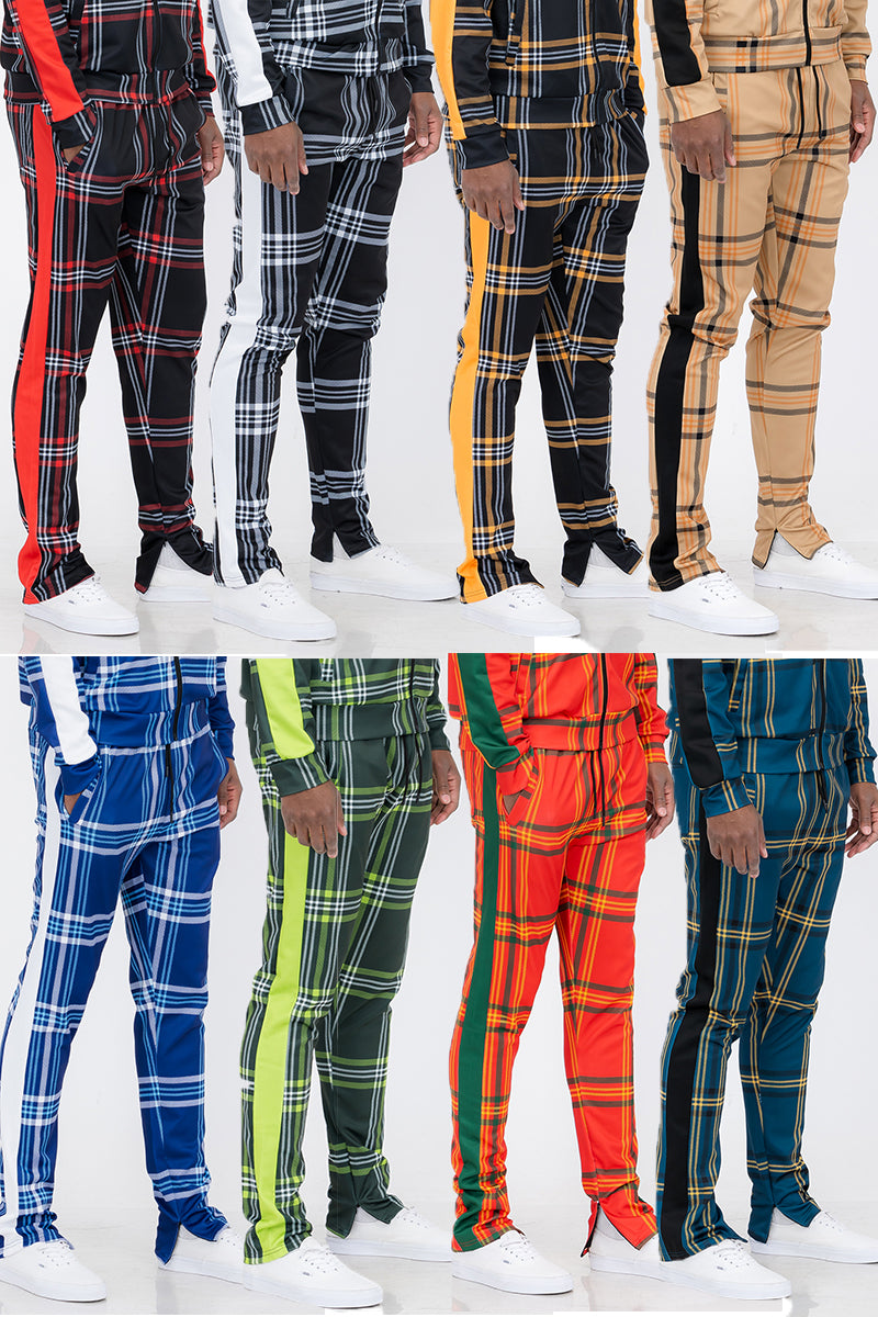 Plaid Out Track Pants featuring an elastic waist, drawstring, and ankle zippers, displayed on a model standing at 5'11 wearing a Large.