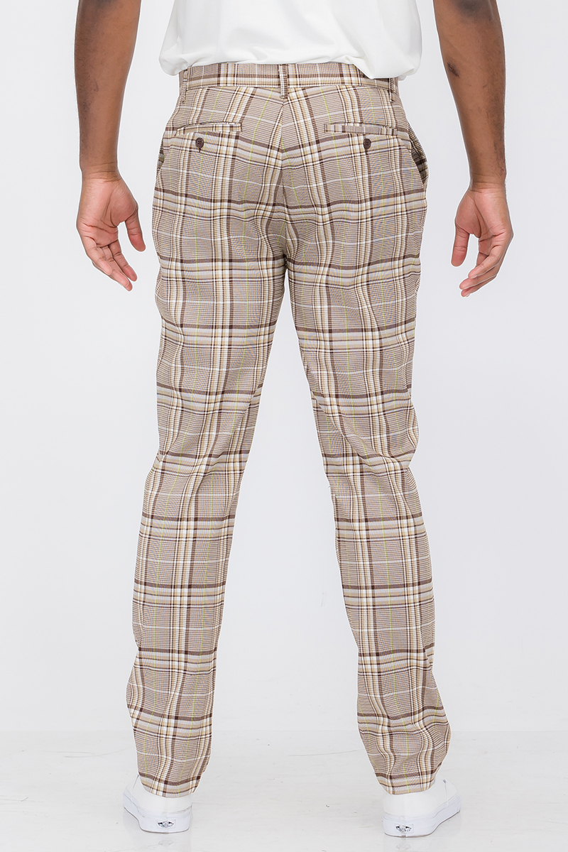 Plaid slim fit trouser pants with button fly closure and pockets, displayed on a model.