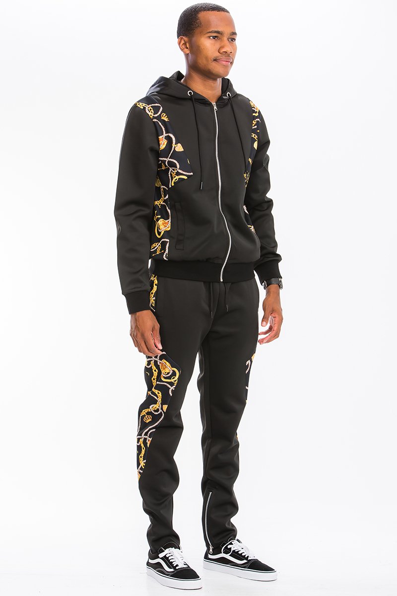 A stylish Poly Span Printed Track Set featuring a regular fit, tug-free zipper pocket, and hidden ankle zippers, perfect for workouts and casual wear.