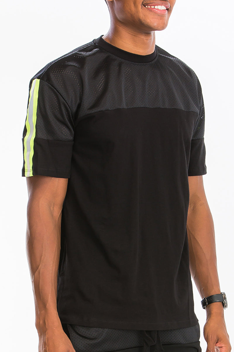 A stylish Quarter Mesh Cotton Tee featuring a soft mesh and cotton blend fabric with reflective tape detail.