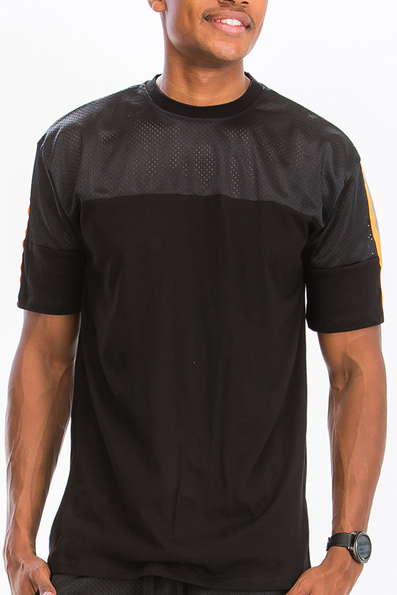 A stylish Quarter Mesh Cotton Tee featuring a soft mesh and cotton blend fabric with reflective tape detail.