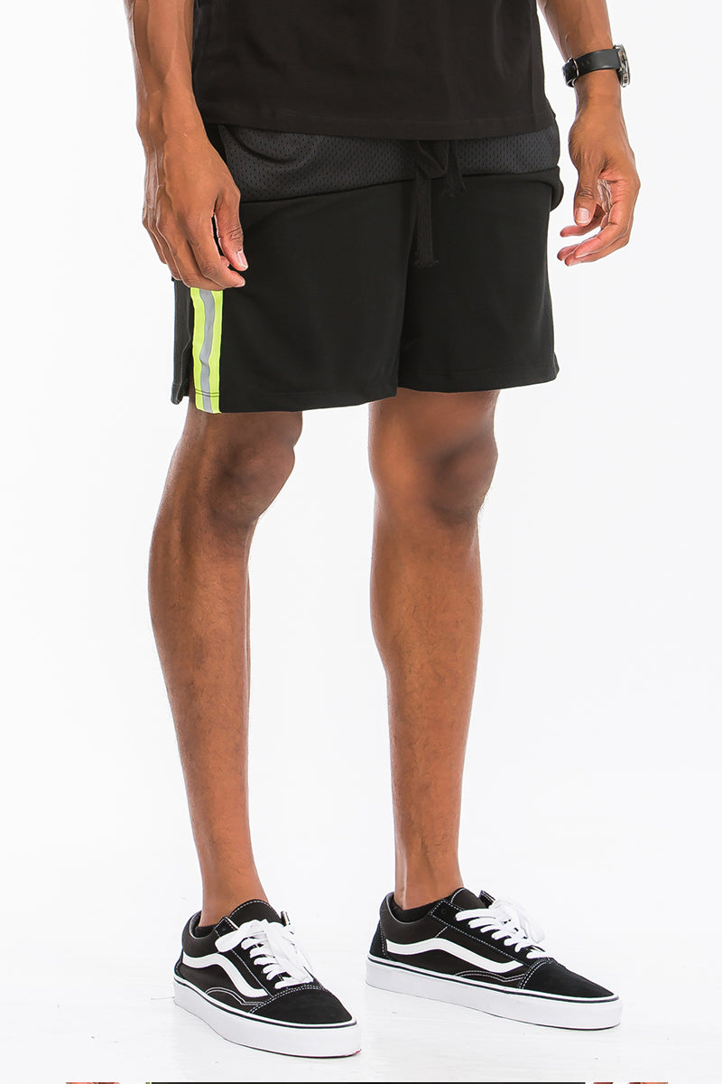 A pair of stylish Quarter Mesh Shorts featuring half mesh and half cotton design, elastic waist with drawstring, and reflective tape along the sides.