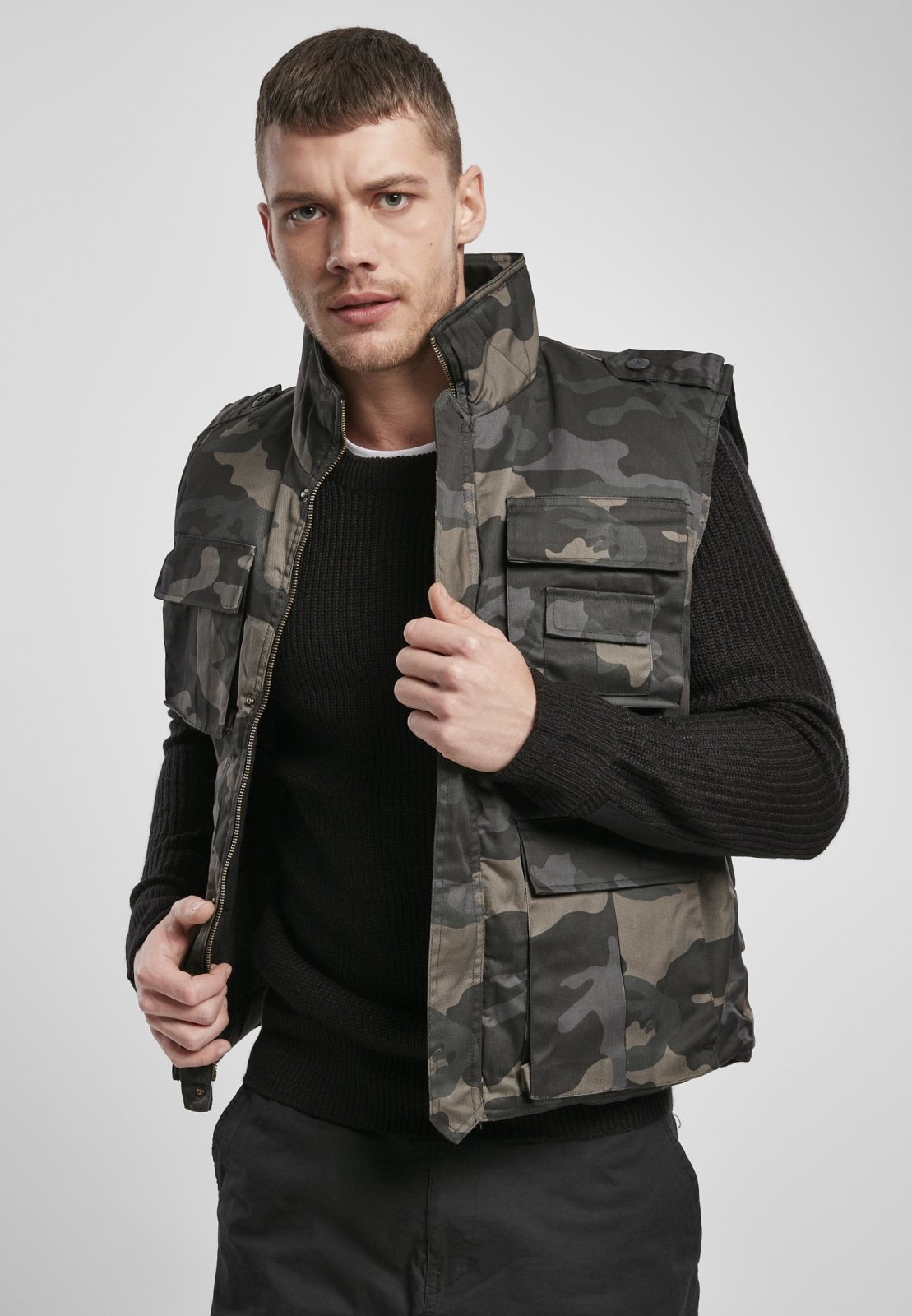 Ranger Tactical Vest featuring multiple pockets, robust metal zip, and comfortable cotton lining, ideal for outdoor activities.