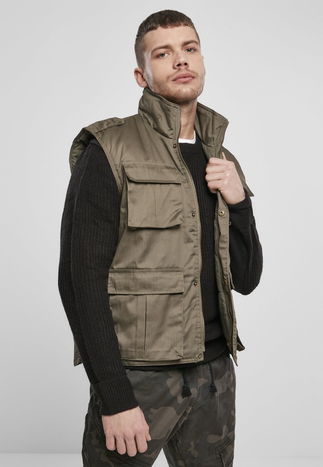 Ranger Tactical Vest featuring multiple pockets, robust metal zip, and comfortable cotton lining, ideal for outdoor activities.