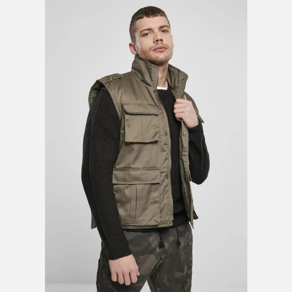 Ranger Tactical Vest featuring multiple pockets, robust metal zip, and comfortable cotton lining, ideal for outdoor activities.