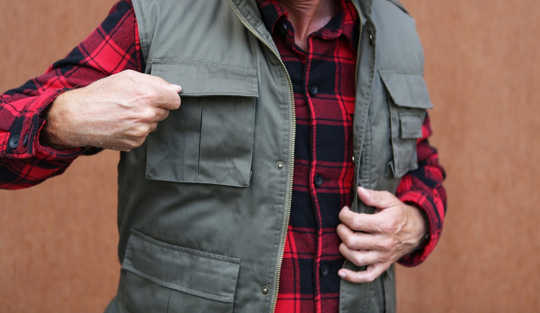 Ranger Tactical Vest featuring multiple pockets, robust metal zip, and comfortable cotton lining, ideal for outdoor activities.