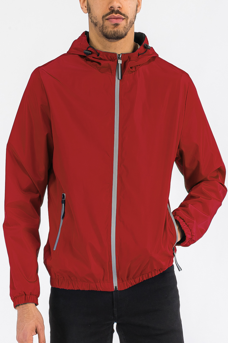 A stylish reflective zip windbreaker jacket in a vibrant color, featuring a full zip closure and hood, ideal for outdoor activities.