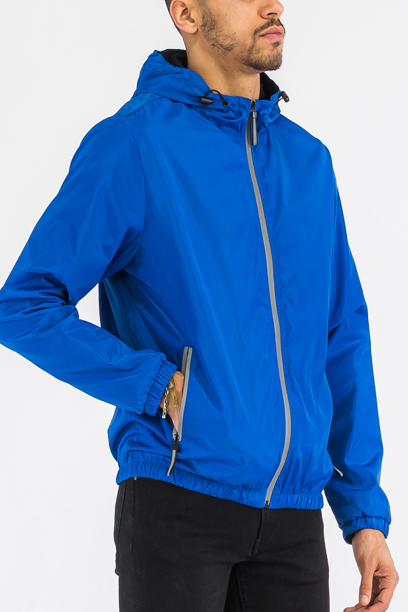 A stylish reflective zip windbreaker jacket in a vibrant color, featuring a full zip closure and hood, ideal for outdoor activities.