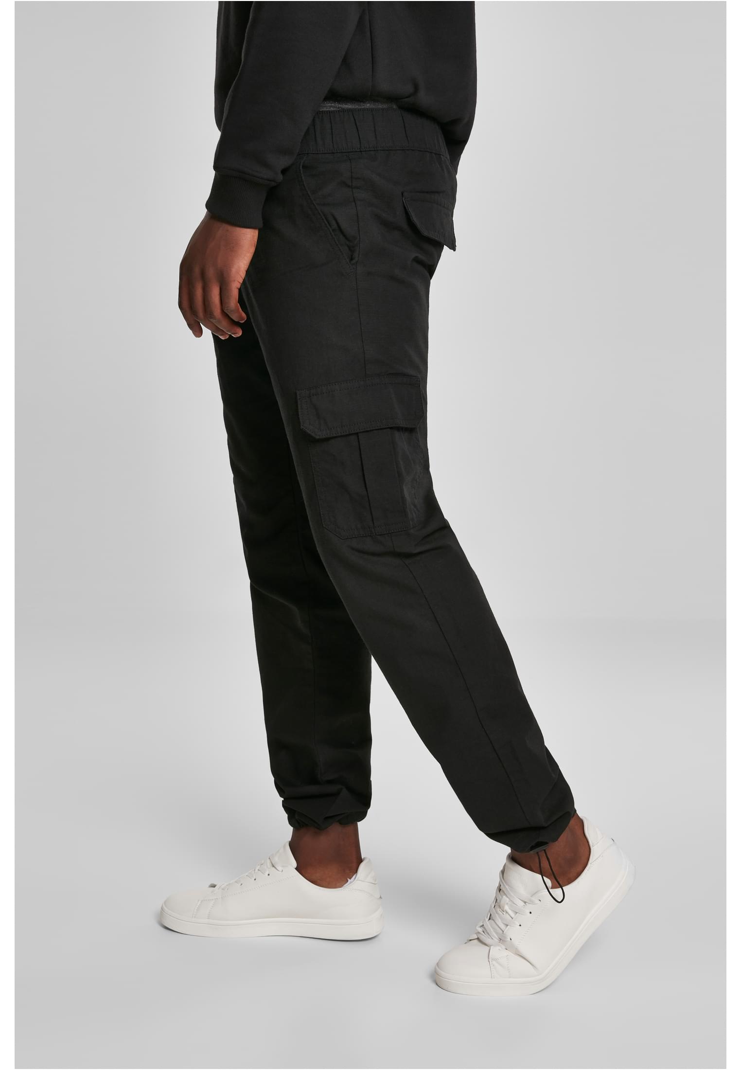 A pair of Ripstop Cargo Pants made from durable cotton twill, featuring multiple pockets and an elastic waistband for a comfortable fit.