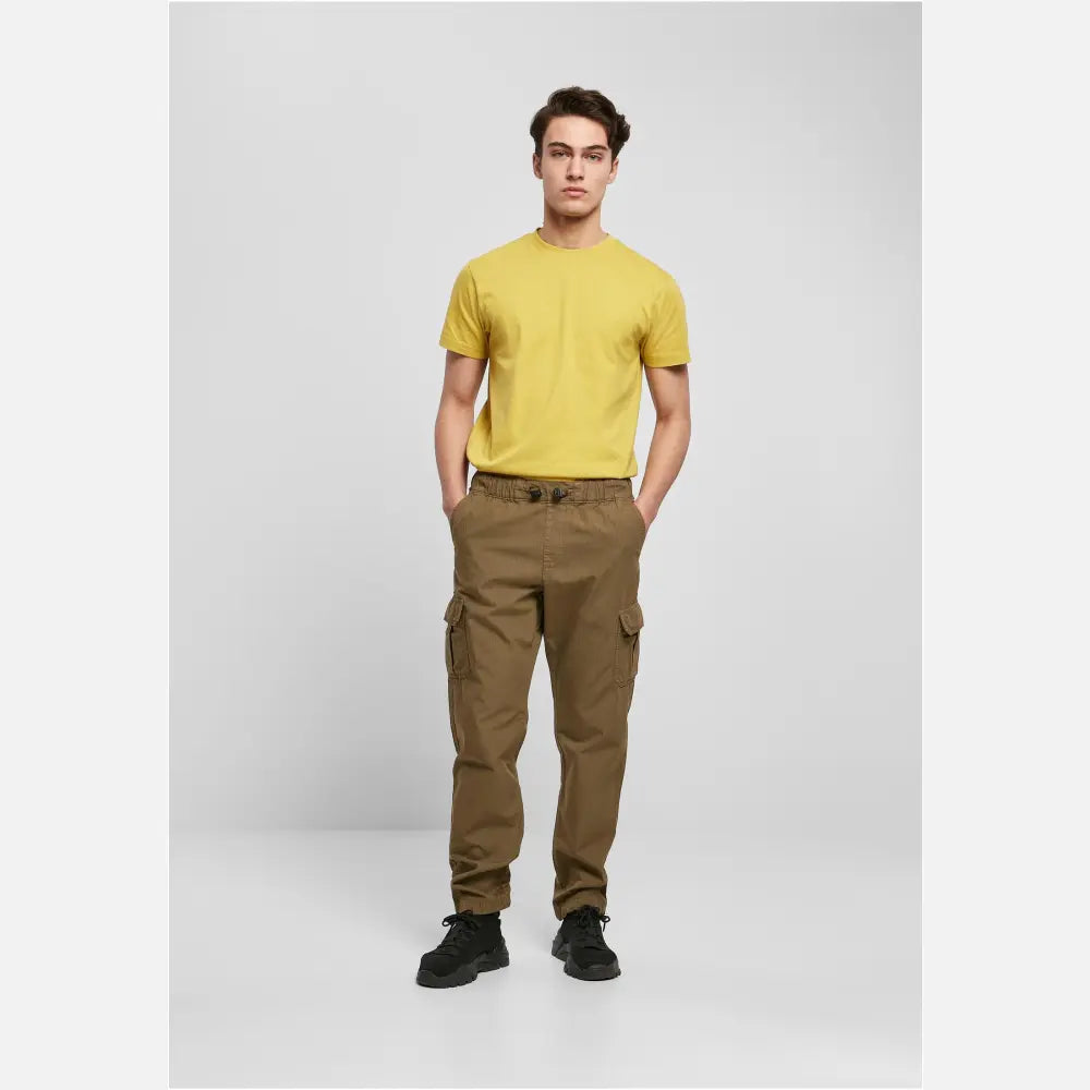 A pair of Ripstop Cargo Pants made from durable cotton twill, featuring multiple pockets and an elastic waistband for a comfortable fit.