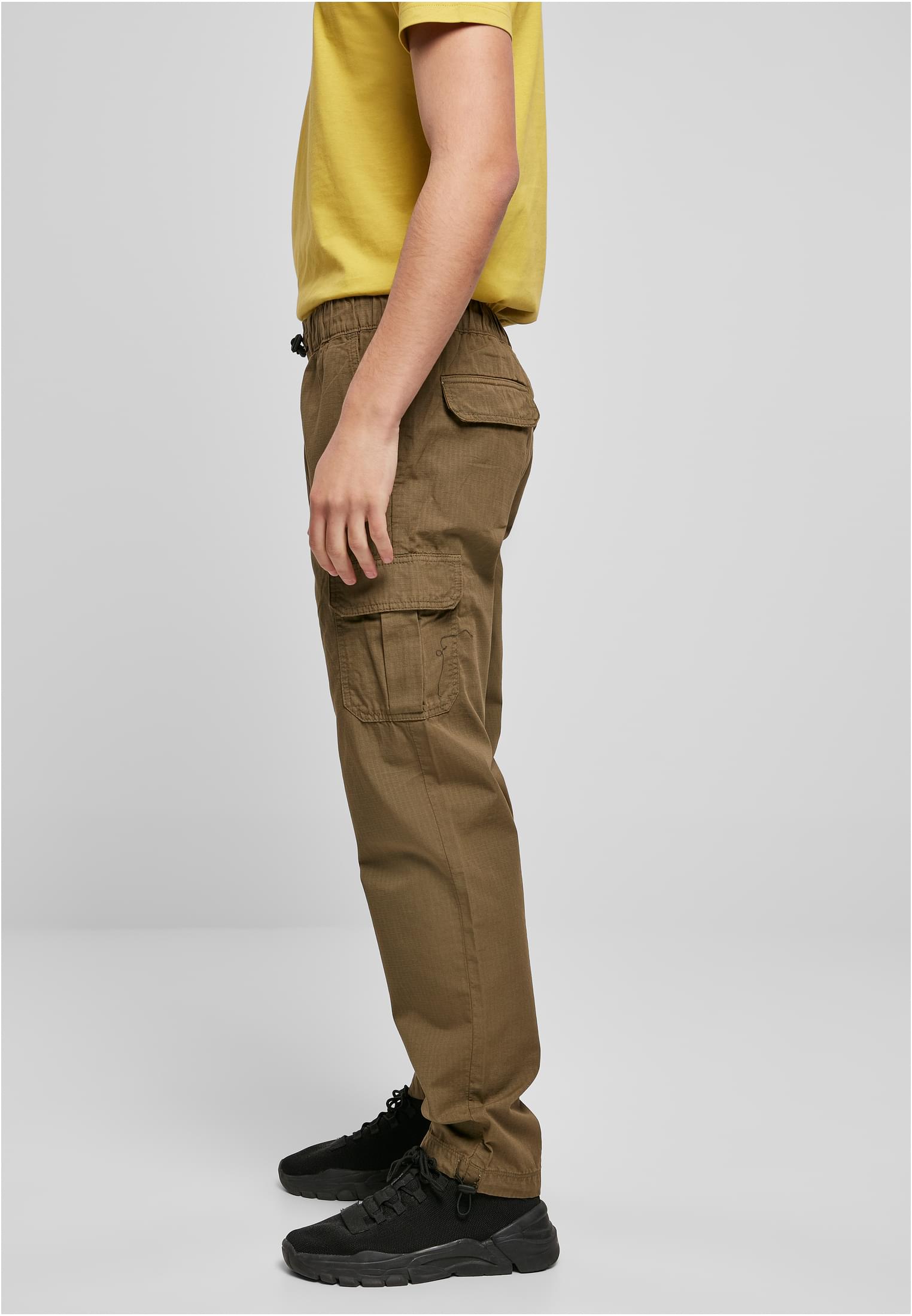 A pair of Ripstop Cargo Pants made from durable cotton twill, featuring multiple pockets and an elastic waistband for a comfortable fit.