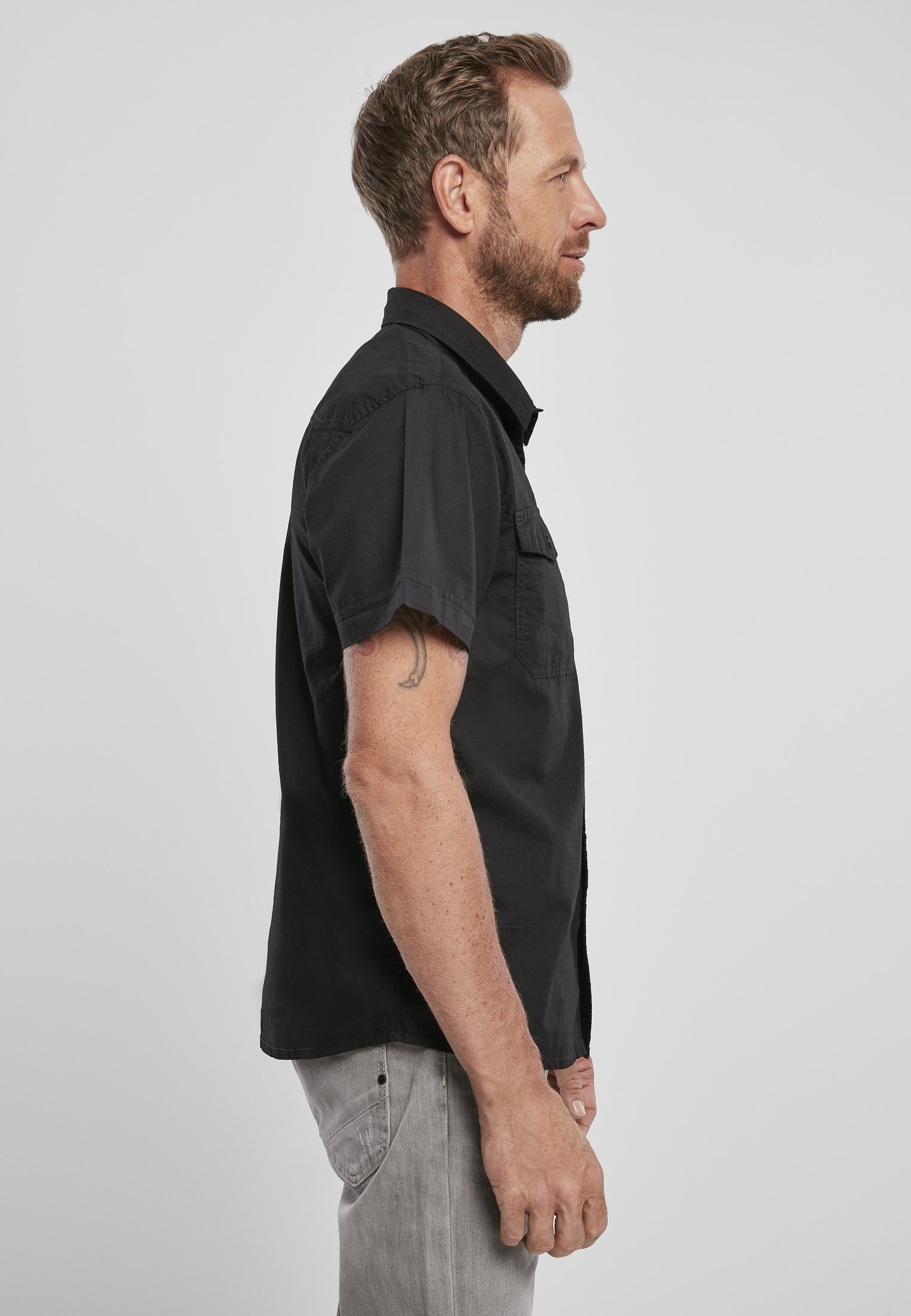 A stylish Roadstar Shirt made from 100% cotton, showcasing its soft texture and versatile design suitable for casual wear.