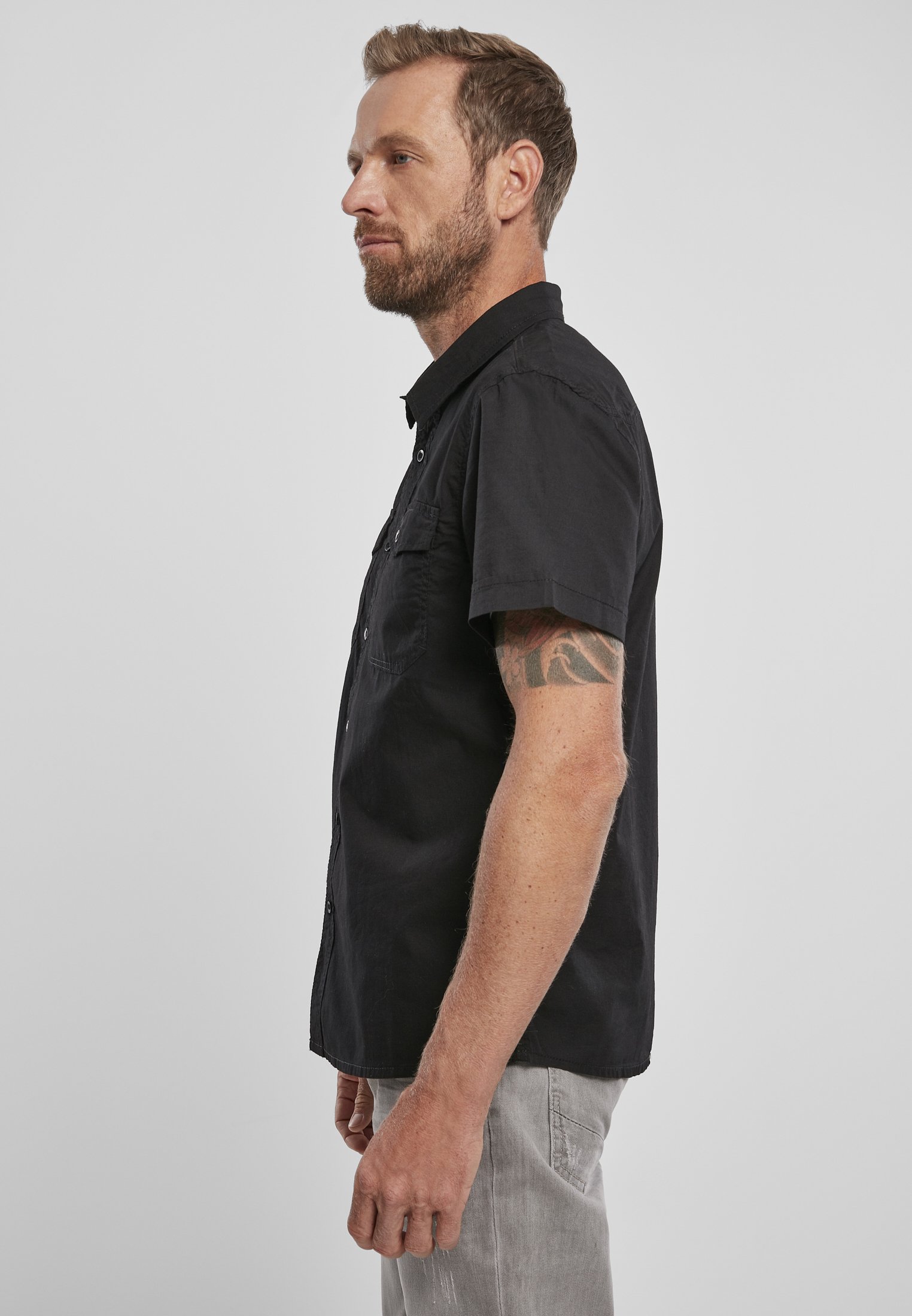 A stylish Roadstar Shirt made from 100% cotton, showcasing its soft texture and versatile design suitable for casual wear.