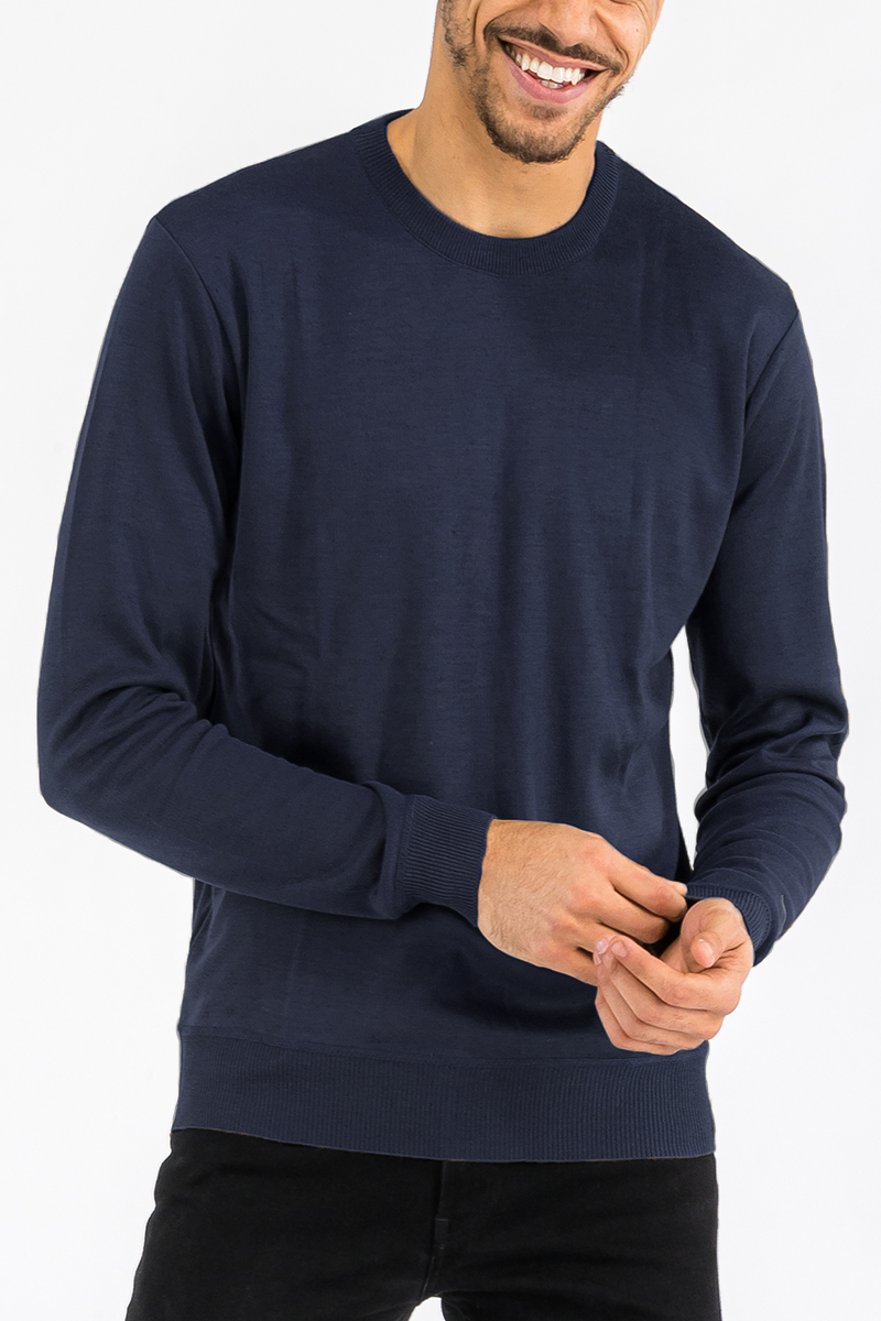 A cozy round neck knit sweater in a soft fabric, showcasing a classic design suitable for casual wear.