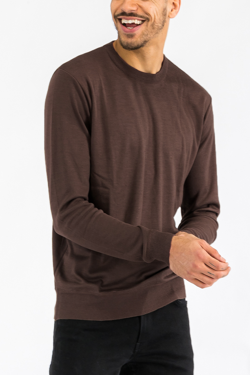 A stylish round neck knit sweater in a regular fit, made from 100% polyester, perfect for layering and everyday wear.