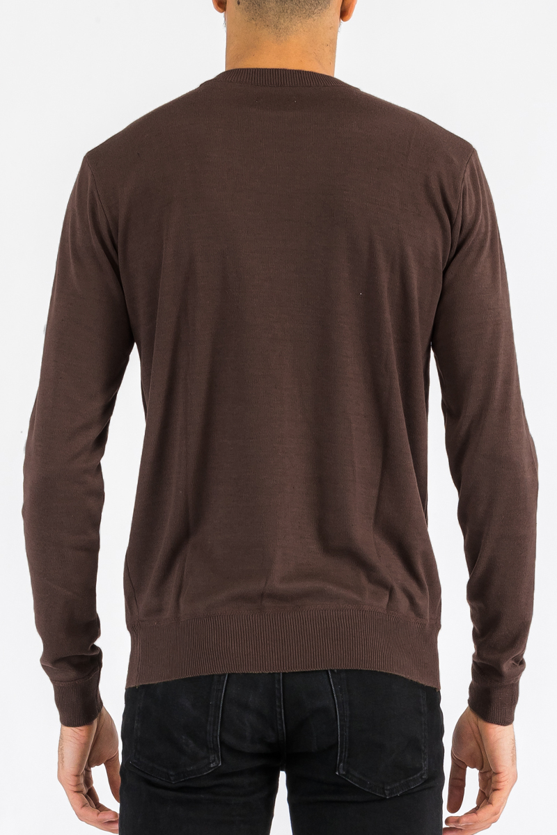 A stylish round neck knit sweater in a regular fit, made from 100% polyester, perfect for layering and everyday wear.