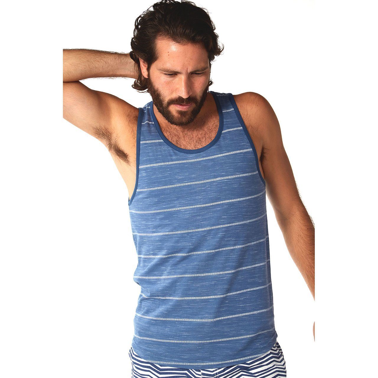 Ryder Tank top featuring an all-over print design, made from 90% cotton and 10% polyester, showcasing eco-friendly manufacturing.