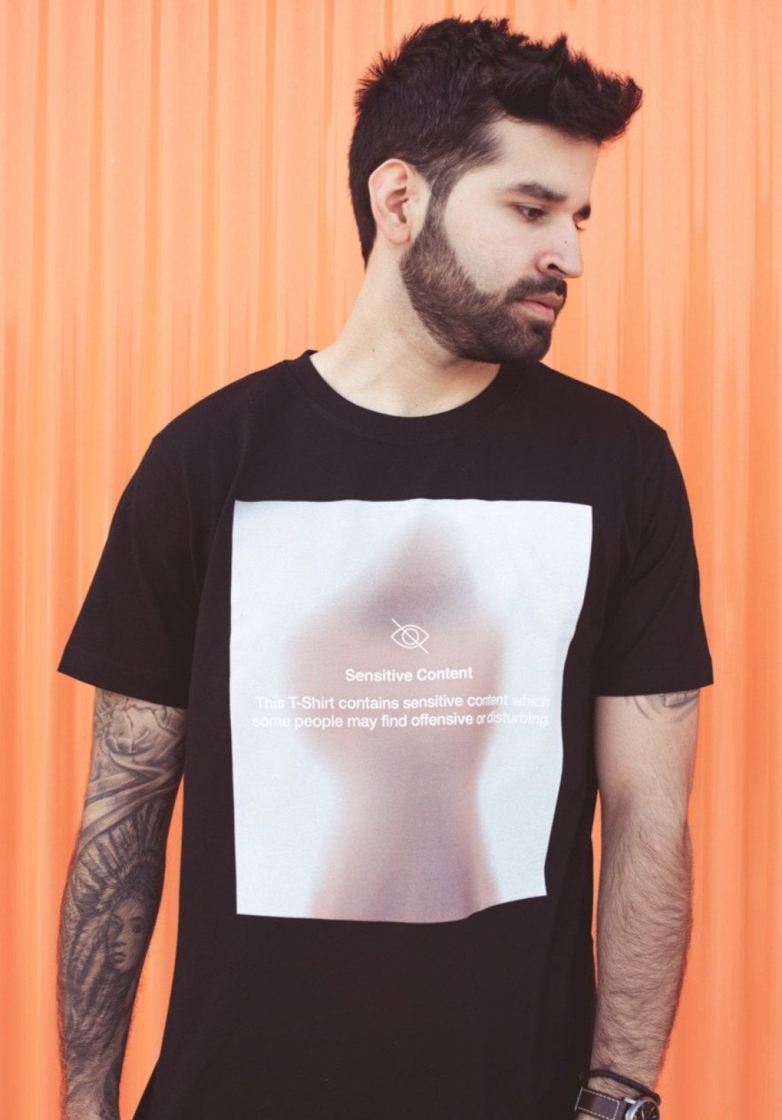 A stylish Sensitive Content T-Shirt made of 100% cotton, featuring a cool print on the chest, perfect for casual wear.