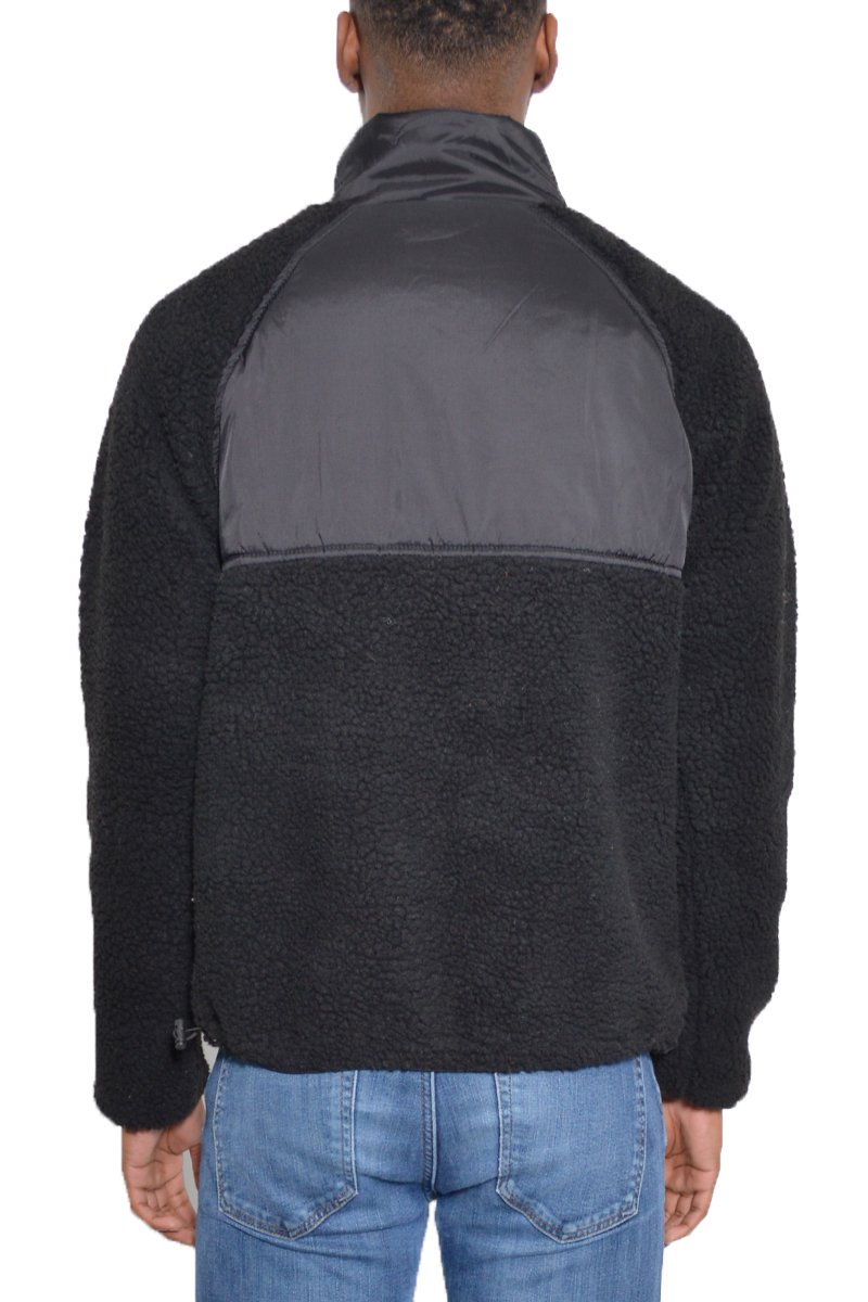 Sherpa Cut Out Fleece Jacket in a stylish design, featuring a full zip and utility pocket, perfect for cold weather.