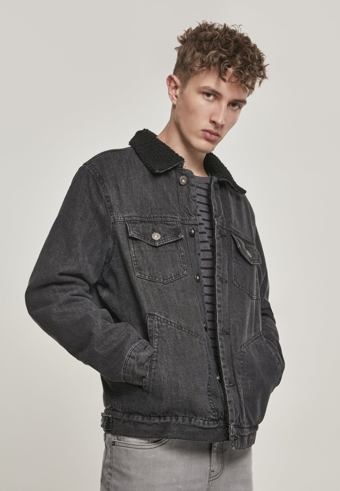 Sherpa Lined Jeans Jacket in Black Wash featuring cozy sherpa lining and durable denim fabric, perfect for stylish layering.