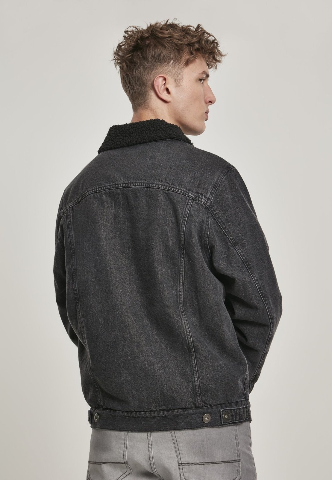 Sherpa Lined Jeans Jacket in Black Wash featuring cozy sherpa lining and durable denim fabric, perfect for stylish layering.