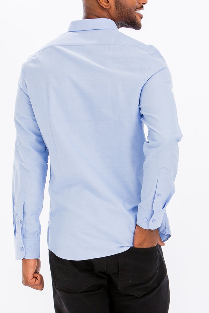 A stylish Signature Long Sleeve Button Down Shirt displayed on a mannequin, showcasing its classic design and premium fabric blend.