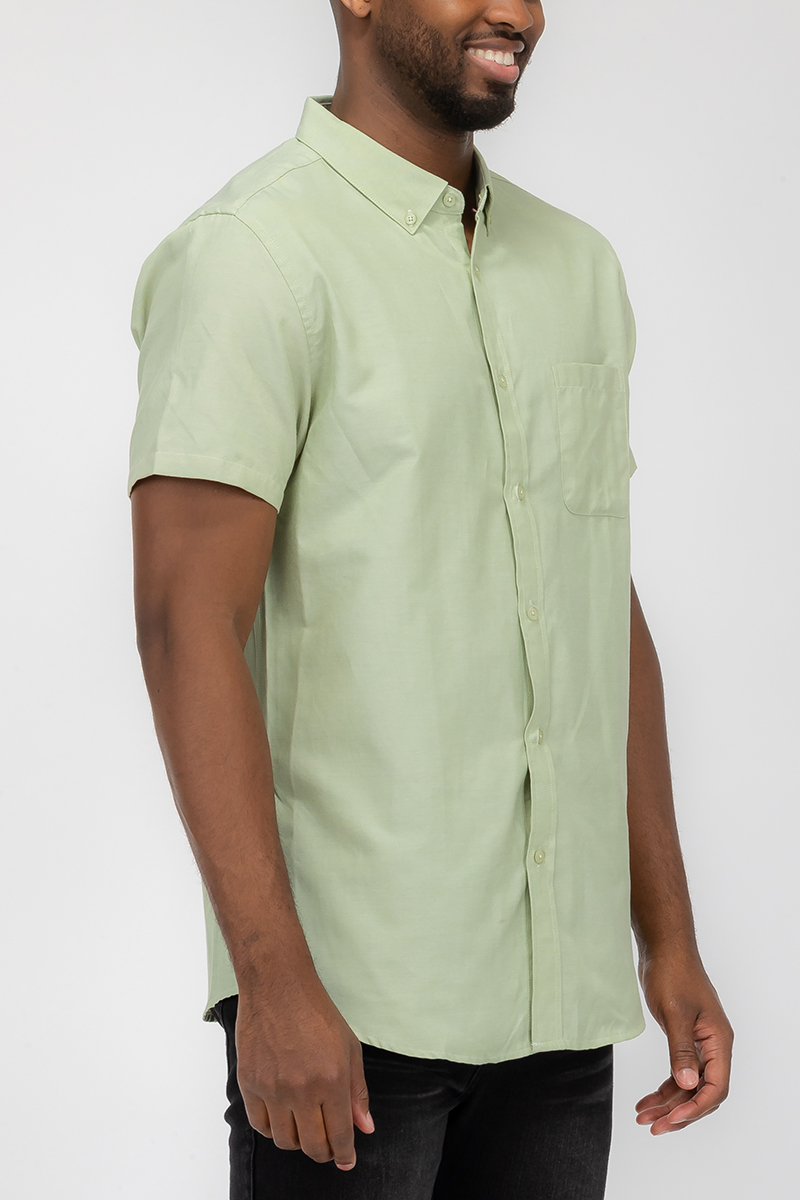 A stylish Signature Short Sleeve Button Down Shirt featuring a faux pocket, lightweight fabric, and a solid color design, perfect for casual wear.