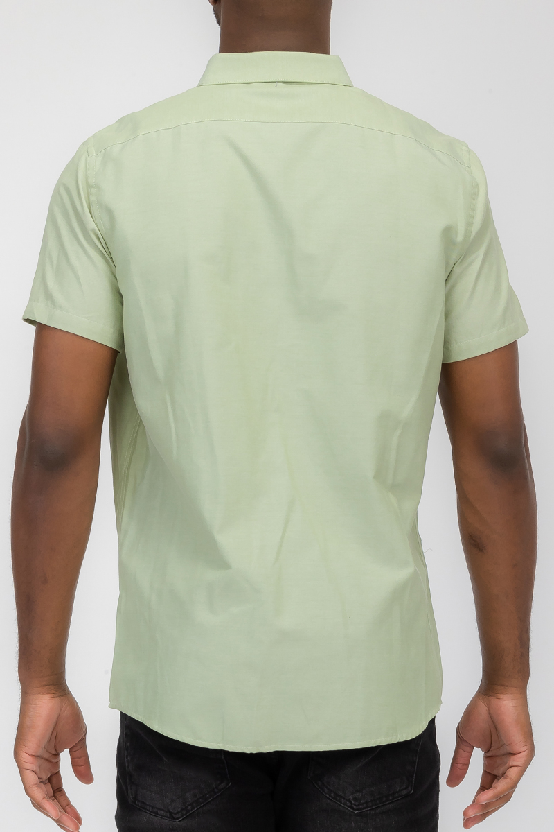 A stylish Signature Short Sleeve Button Down Shirt featuring a faux pocket, lightweight fabric, and a solid color design, perfect for casual wear.