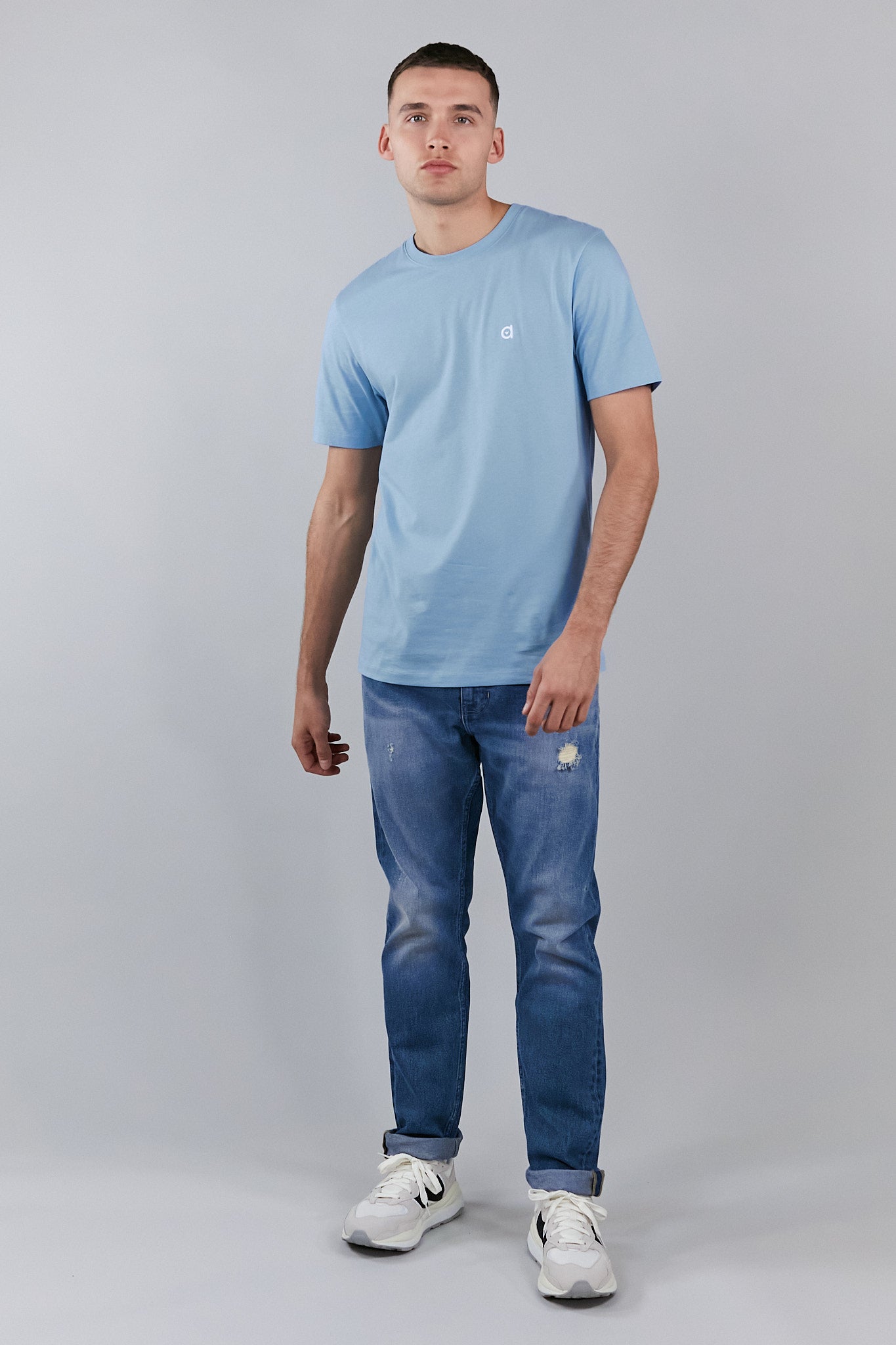 Sky blue low carbon t-shirt made from soft touch cotton, featuring an altid embroidered logo.