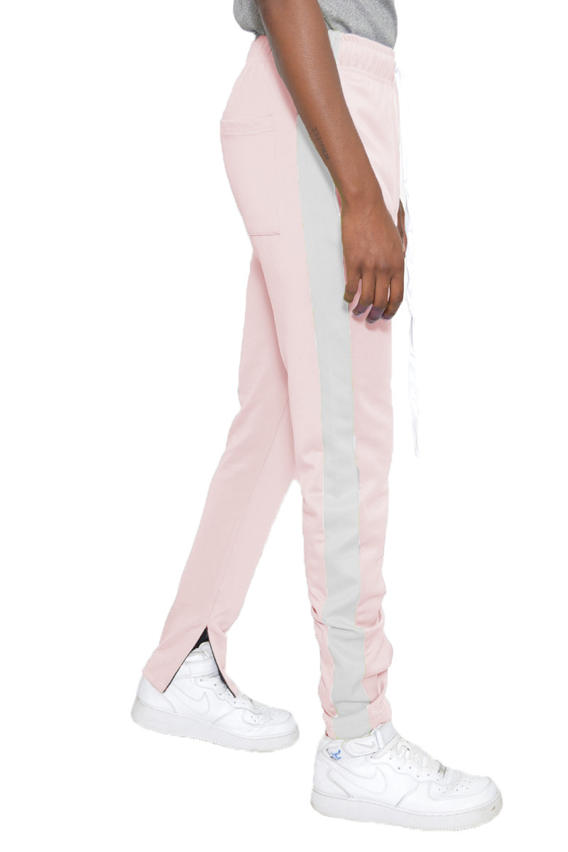 A pair of stylish slim fit track pants featuring a single stripe detail and hidden ankle zippers, perfect for workouts and casual wear.