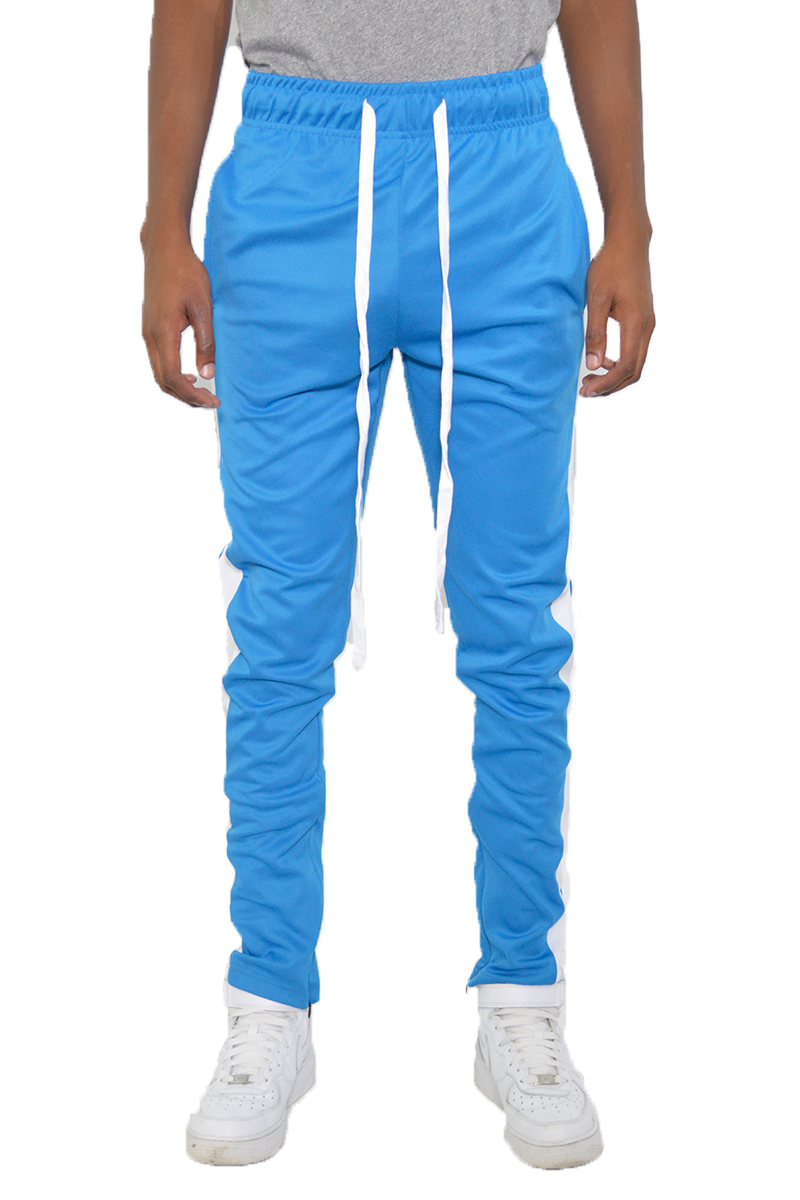 A pair of sleek slim fit track pants featuring a single stripe detail and hidden ankle zippers, perfect for workouts and casual wear.