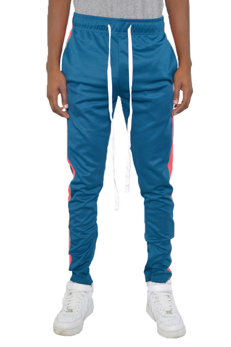 A pair of stylish slim fit track pants featuring a single stripe detail, tug-free zipper closure, and hidden ankle zippers, perfect for active wear.