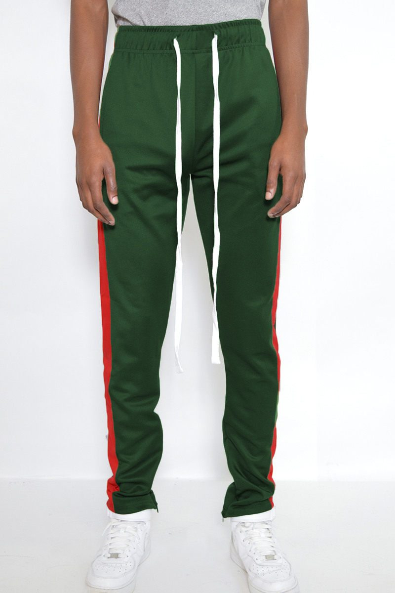 A pair of stylish slim fit track pants featuring a single stripe detail and hidden ankle zipper, perfect for active wear.