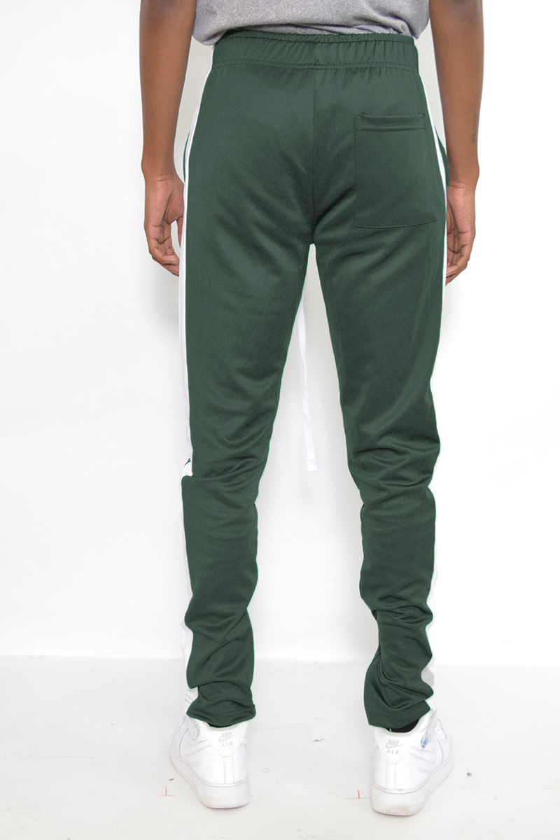 A pair of sleek slim fit track pants featuring a single stripe detail and hidden ankle zippers, perfect for workouts and casual wear.