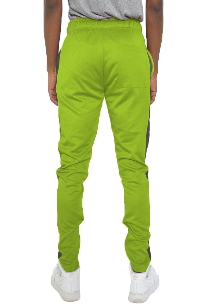 Slim fit track pants in vibrant lime and white with single stripe detail and hidden ankle zipper.