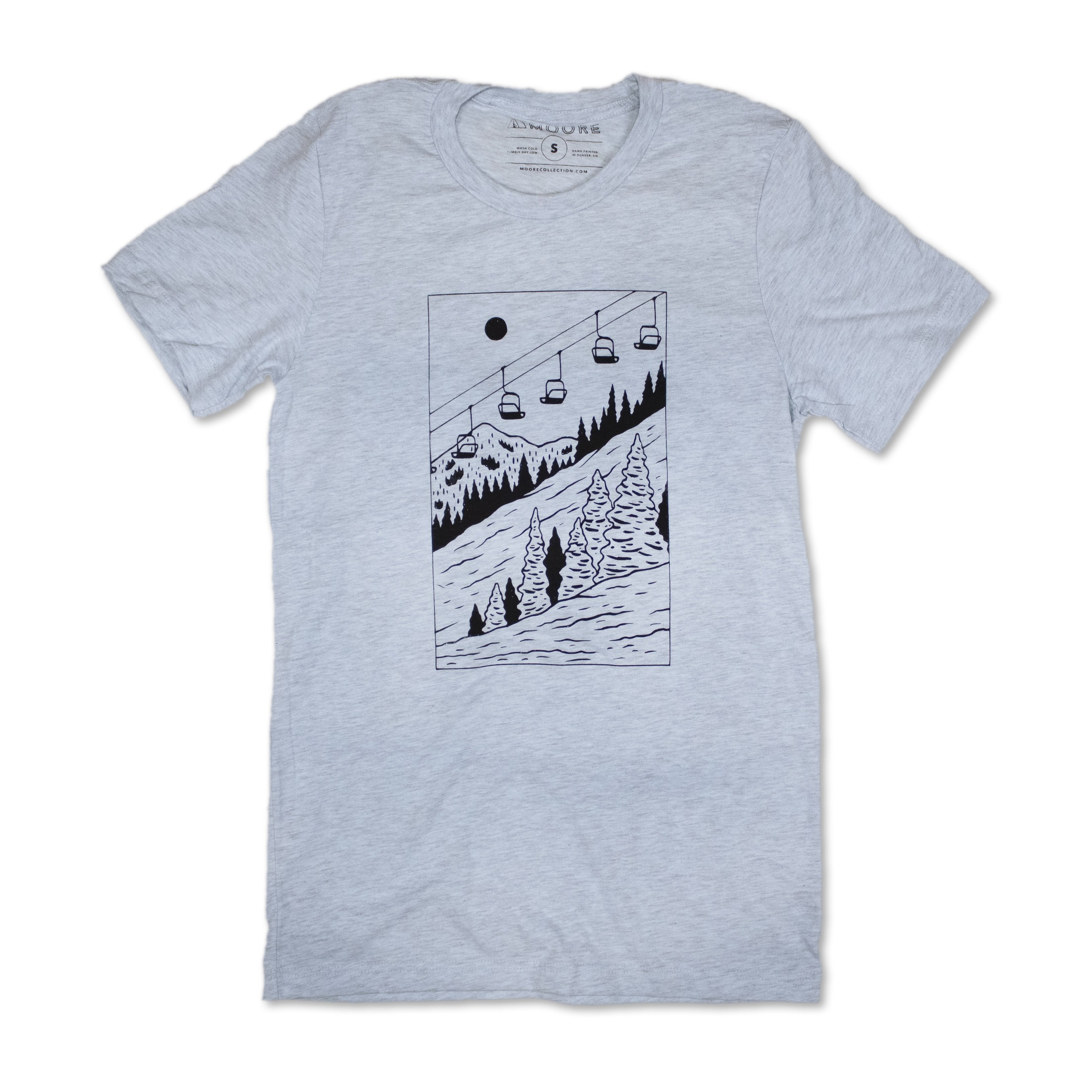 Ice blue Slope Tee featuring ski lift design, made from soft tri-blend fabric.