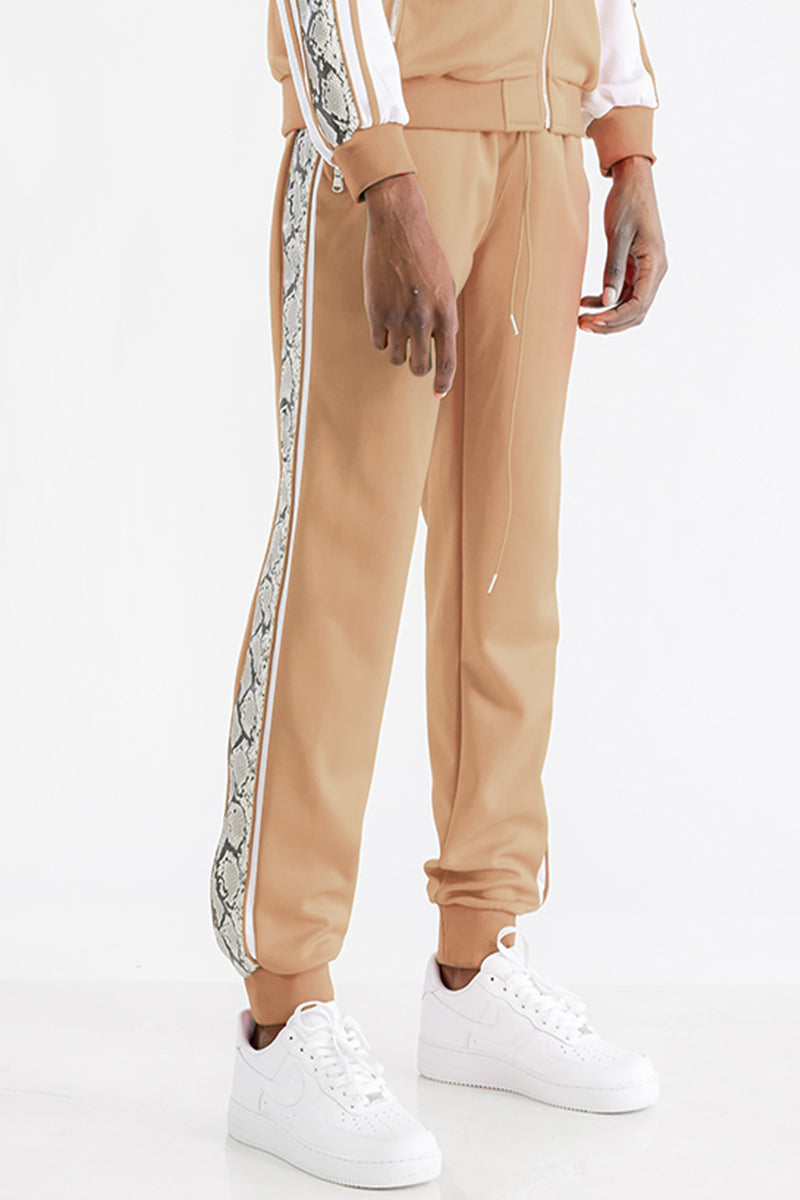 Stylish Snake Side Joggers featuring elastic waist, ankle zippers, and unique snake detail along the sides.