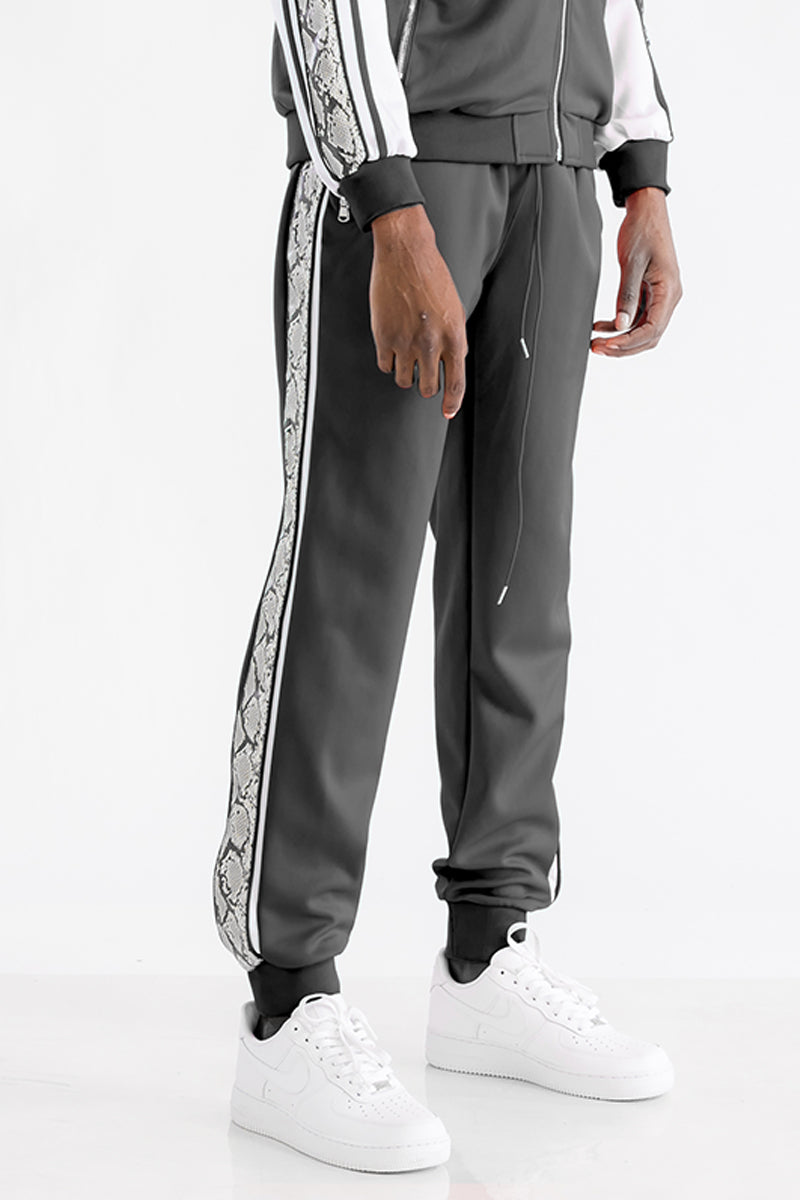 Stylish Snake Side Joggers featuring elastic waist, ankle zippers, and unique snake detail along the sides.