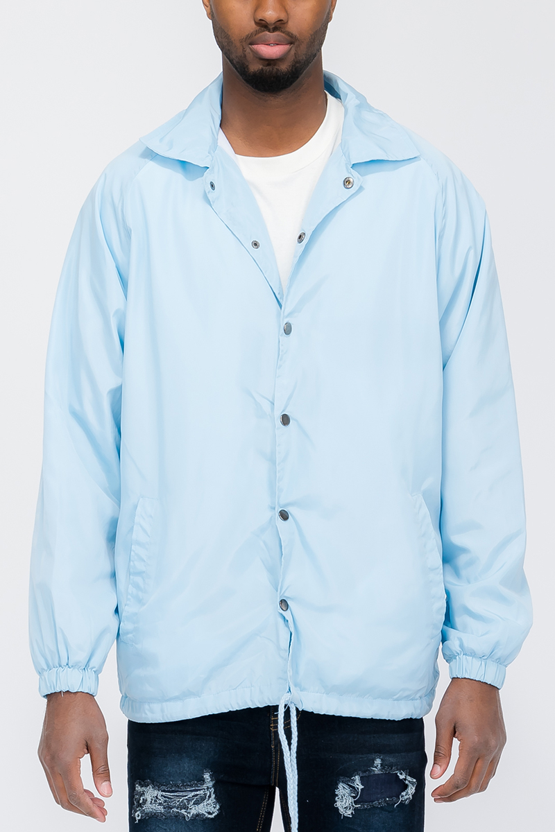 Solid Coachs Jacket in stylish design with snap button closure, made from weather-resistant 100% polyester.