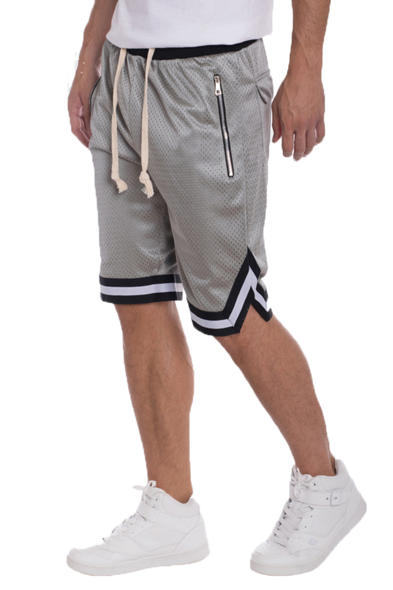 Solid Mesh Basketball Active Shorts featuring elastic waistband, drawstring, and side zippered pockets in a stylish design.