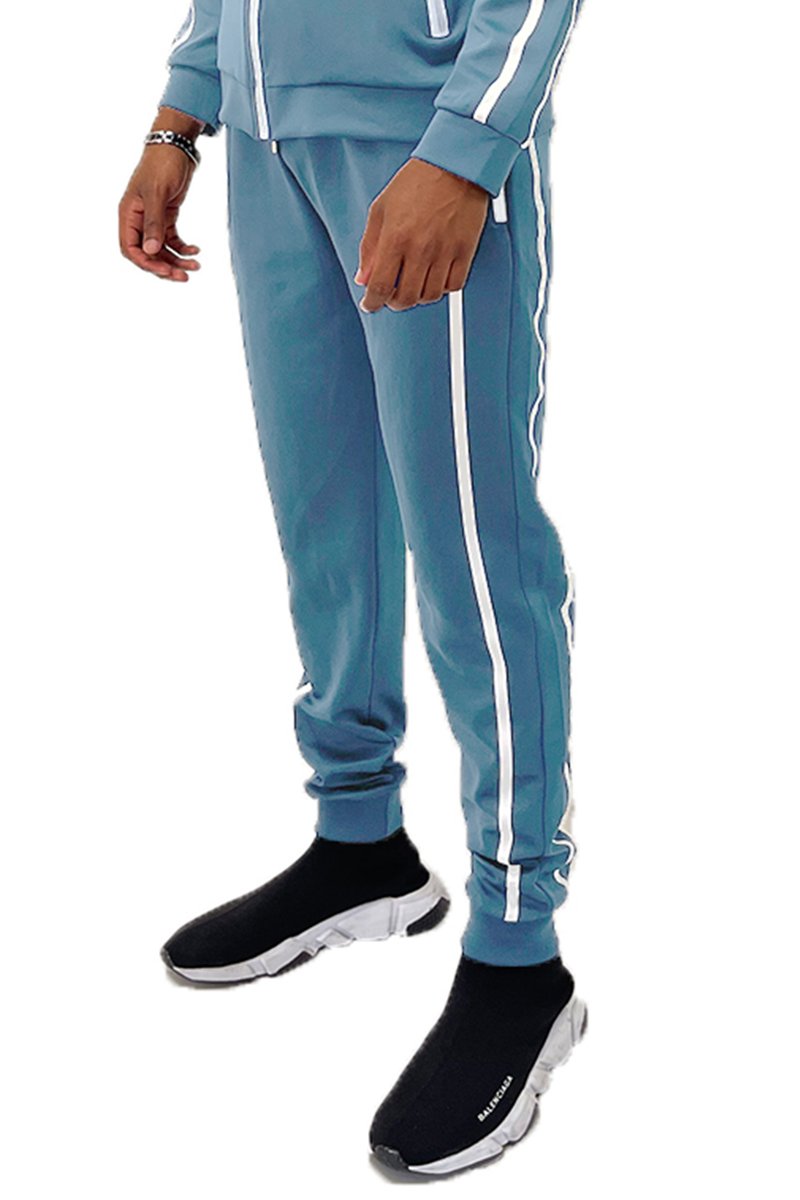 A pair of stylish Solid Tape Jogger Pants featuring an elastic waist and zippered pockets, perfect for casual wear.