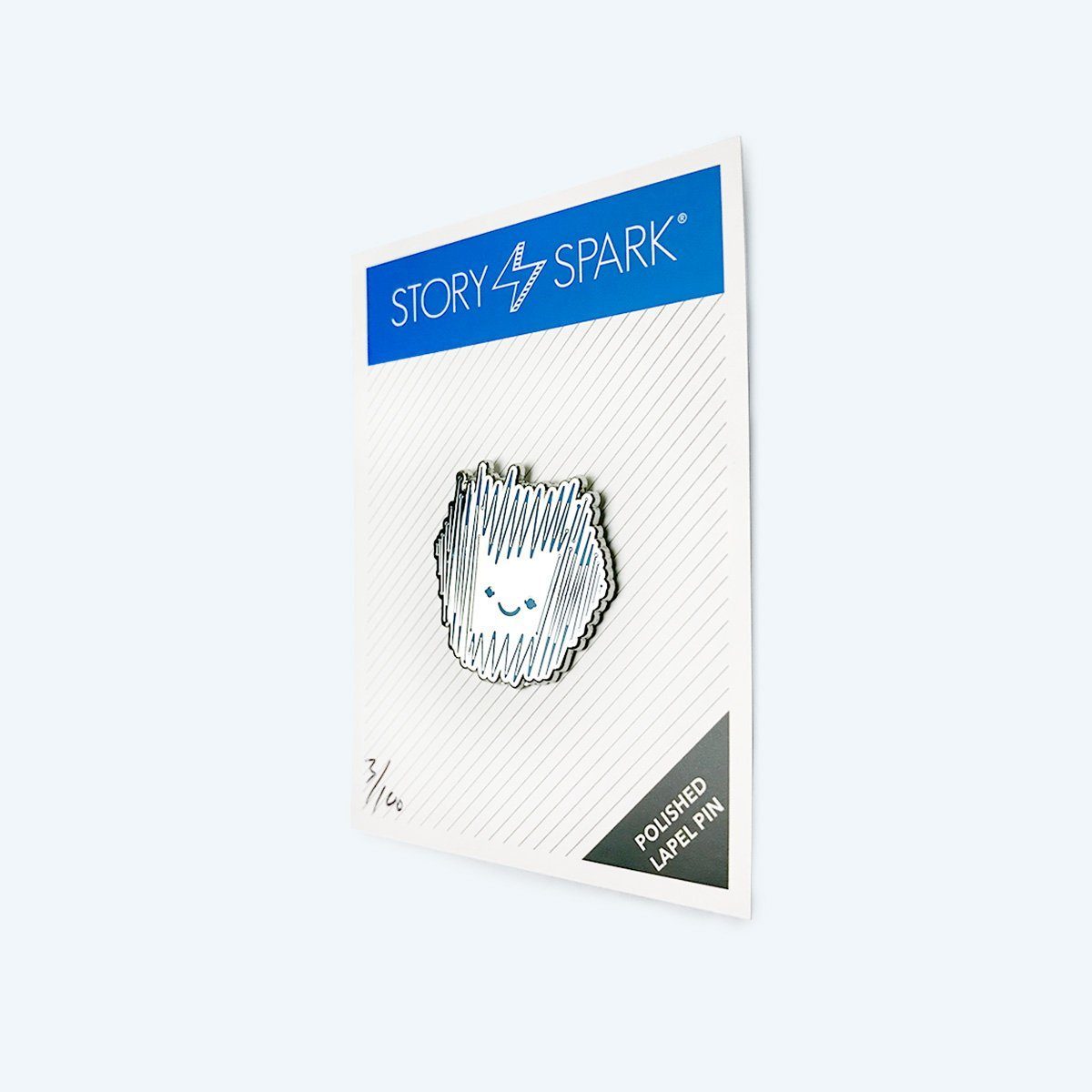 Sparky Enamel Pin featuring a blue and reflective silver design, round shape, and polished smooth finish.