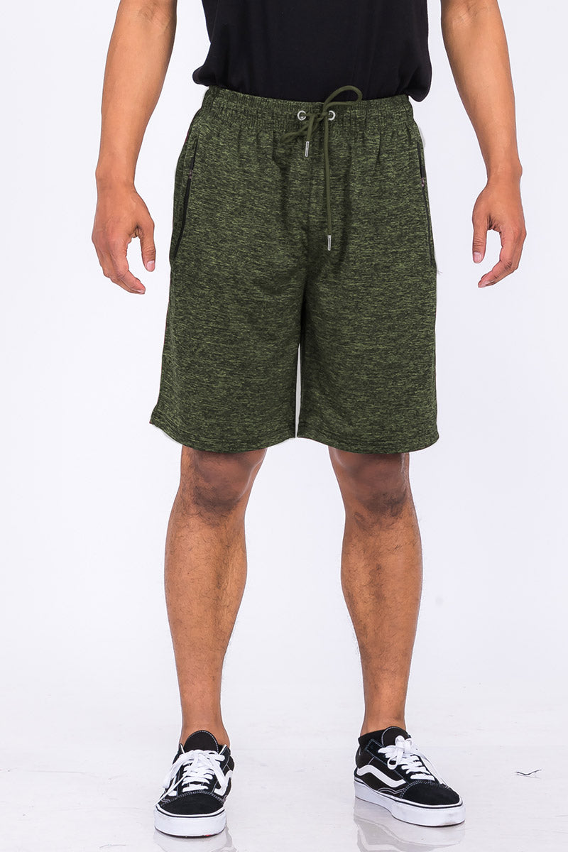 A pair of speckled performance shorts featuring an elastic waist, drawstring, and pockets, designed for comfort and mobility.