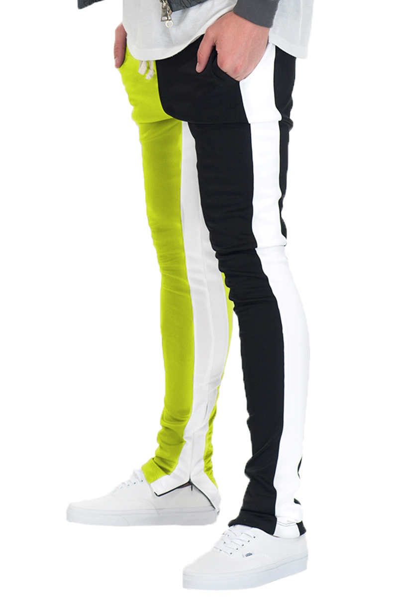 A pair of stylish Split Two Tone Track Pants featuring an elastic waist, drawstring, and hidden ankle zippers, perfect for workouts and casual wear.