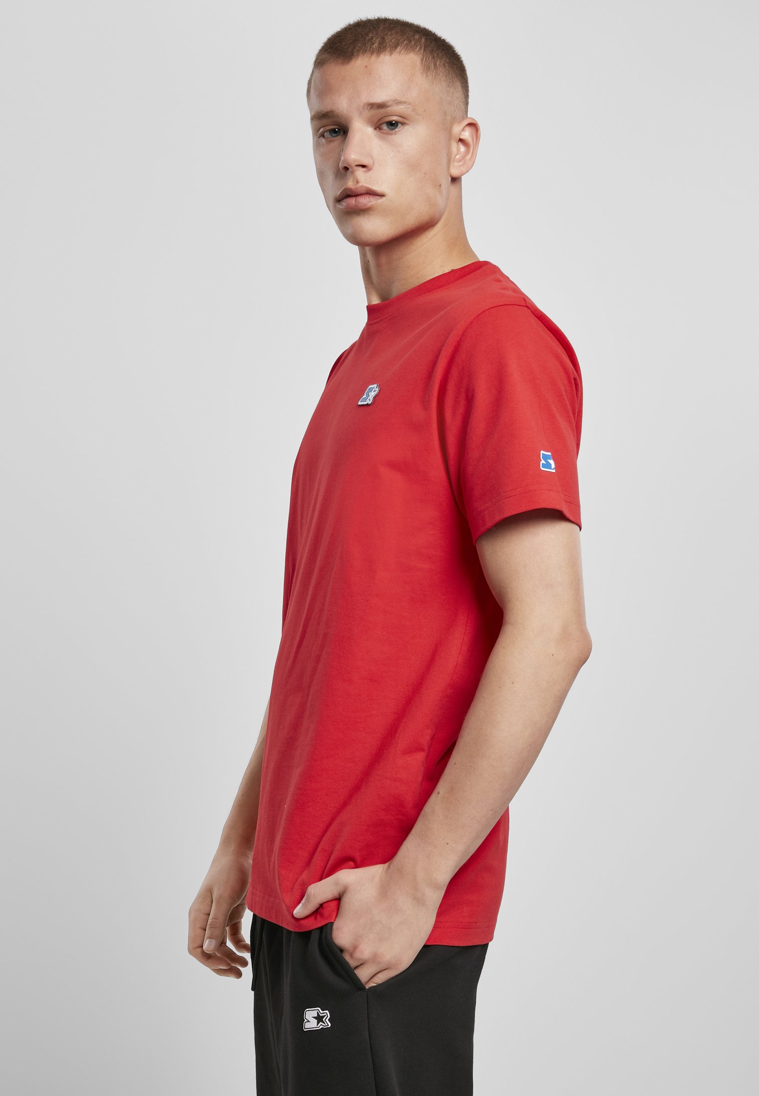 A stylish Starter Essential Jersey made from 100% cotton, showcasing its soft texture and versatile design in a variety of colors.