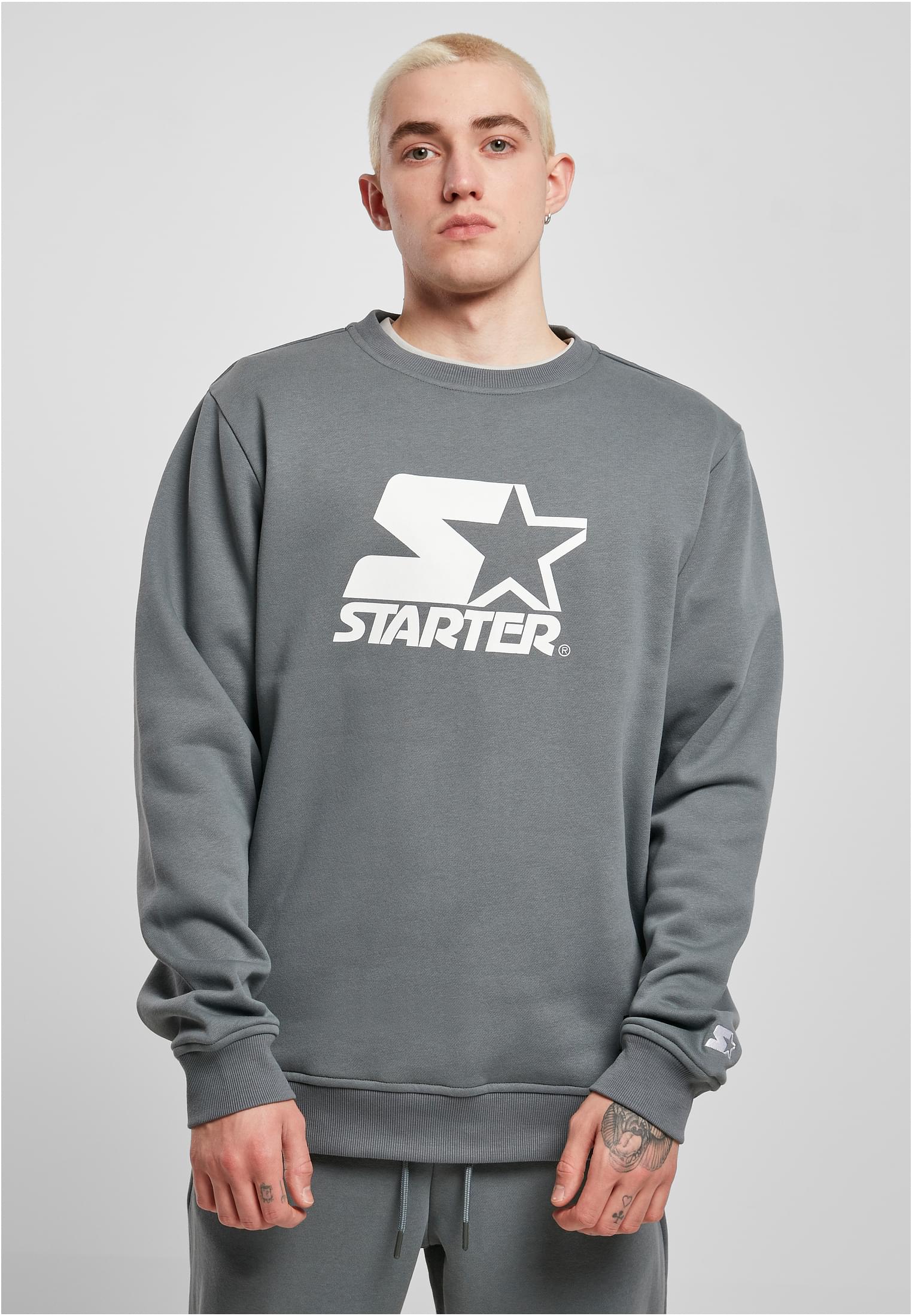 Men's Starter Logo Crewneck Sweatshirt featuring a large logo print on the chest, ribbed cuffs, and a round neck design in soft brushed fleece.