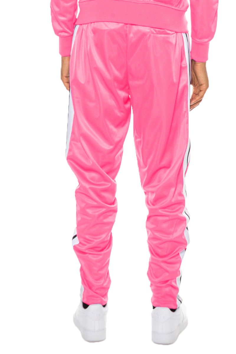 Striped Tape Track Pants featuring an elastic waist, ankle zippers, and pockets, made from 100% polyester.