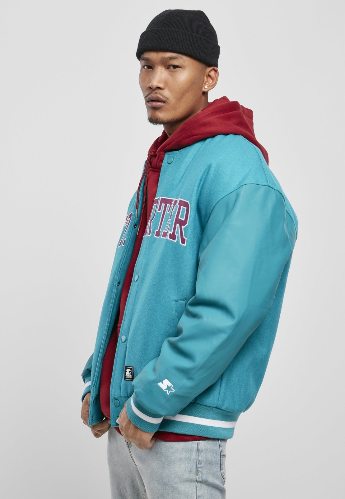 Men's Team Authentic Oldschool College Jacket featuring contrasting sleeves, embroidered branding, and sporty striped cuffs.